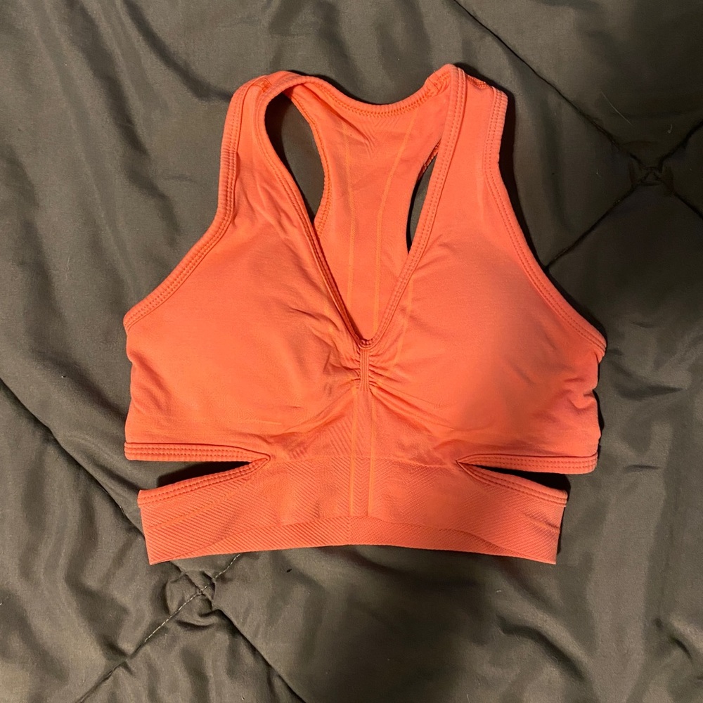 Like new Alphalete stratus bra in color Pixel Pink. Size XS